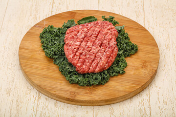 Raw beef burger cutlet for cooking