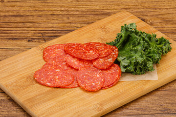Italian spycy pepperoni sausage slices