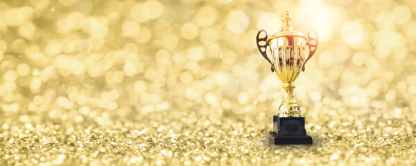 1st champion award, the best prize and winner concept, championship cup or winner trophy on golden...