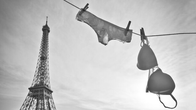 Woman's panties and bra hanging on clothes lines. Romantic card from Paris France. From Paris with Love concept