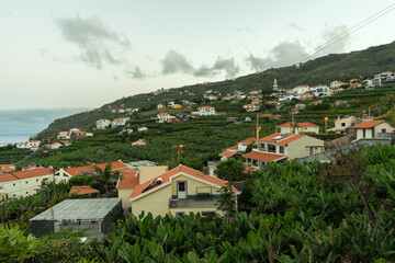 Naklejka na ściany i meble Sunset over Village on Madeira