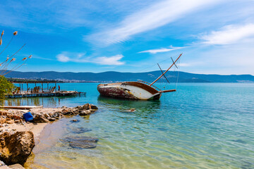 Sunked yacht on Akbuk Beach in Didim