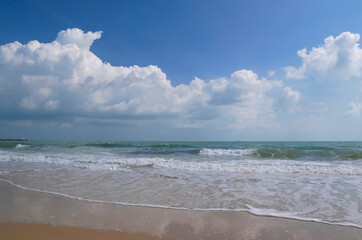 Fototapeta na wymiar Beautiful tropical sea and sand beach with blue sky for background