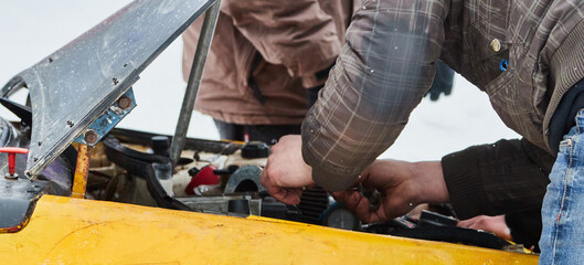 man working on a machine