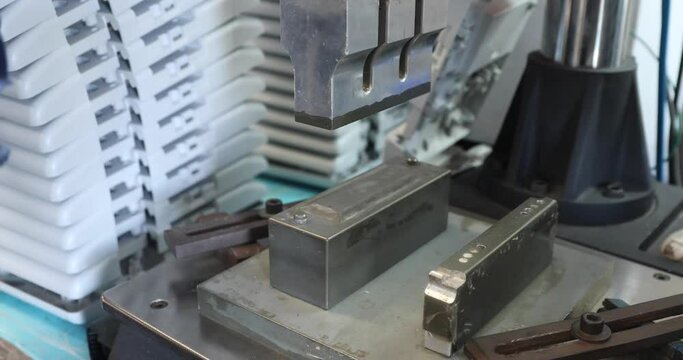 Worker Placing A Plastic Product In A Machine For Ultrasonic Welding -Close Up , 4K