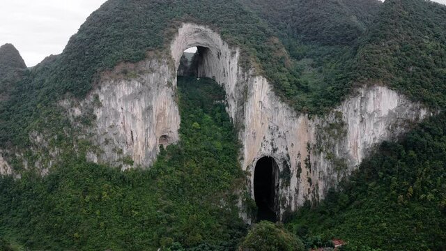 Chinese karst mountain, natural Great Arch of Getu Valley, aerial view