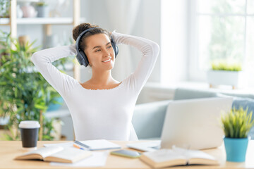 Obraz premium woman working on laptop at home.