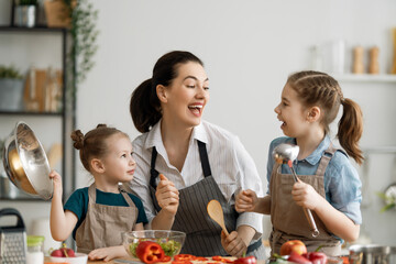 Happy family in the kitchen.