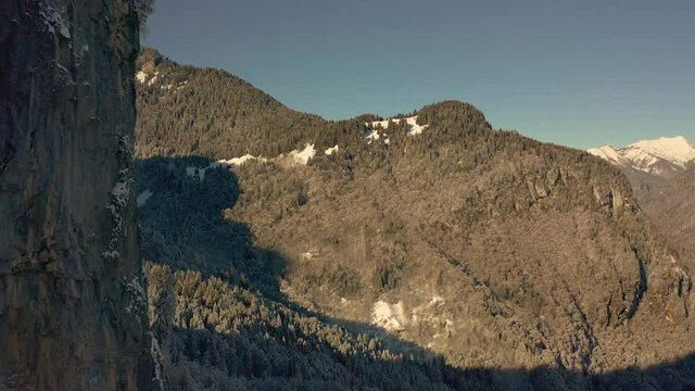 An Aerial View of the Vall&eacute;e du Giffre Revealed behind a Massive Cliff during winter, French Alps.