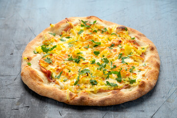 Homemade Potato, Ham Pizza with Mozzarella Cheese