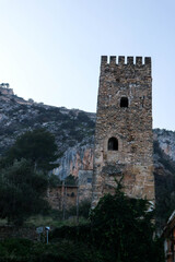 Fototapeta na wymiar old medieval tower of Xativa fortress, Spain
