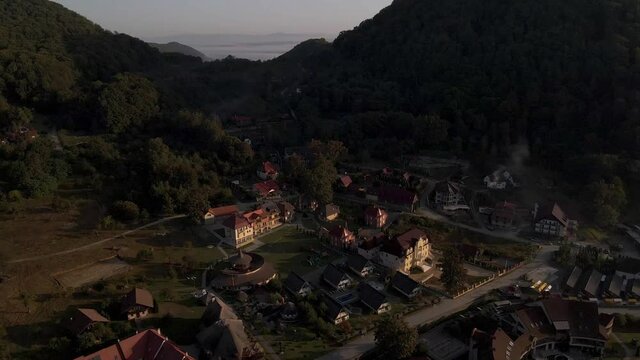 Aerial shot of tiny Ukrainian village during golden hour