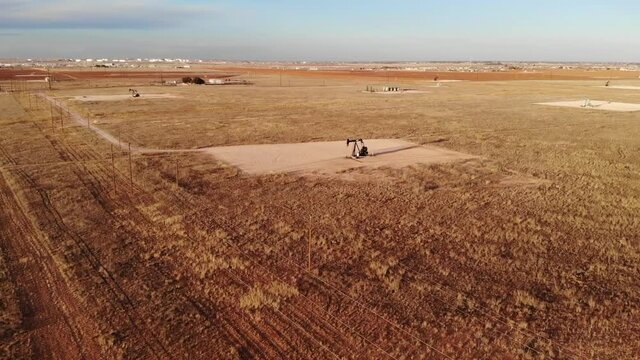 Located just outside the city of Midland, Texas there are just fields of Pumpjacks. Here is one! This shot features a movement around the pumpjack.