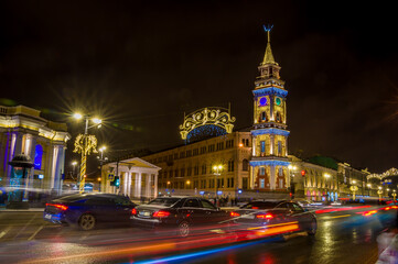 Fototapeta na wymiar Shadows of St. Petersburg. Christmas holiday night in New Year's lights.