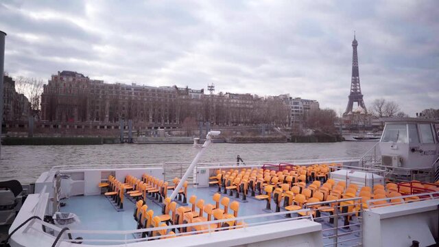 Empty tourist river boats in Paris during lockdown during the Covid-19 pandemic, with view of the Eiffel Tower, tourism in France