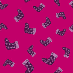 Winter seamless pattern with purple colored winter socks print. Pink bright background. Random print.