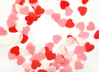 Red pink and white hearts on a white background. Valentine's day concept. Selective focus. Postcard. Background.