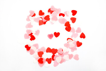 Red pink and white hearts on a white background. Valentine's day concept. Selective focus. Postcard. Background.