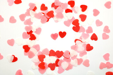 Red pink and white hearts on a white background. Valentine's day concept. Selective focus. Postcard. Background.
