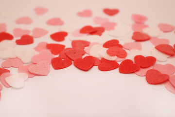 Red pink and white hearts on a white background. Valentine's day concept. Selective focus. Postcard. Background.