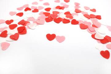 Red pink and white hearts on a white background. Valentine's day concept. Selective focus. Postcard. Background.