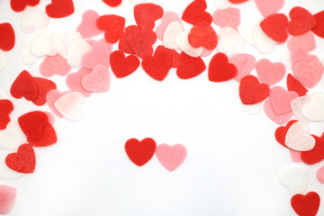 Red pink and white hearts on a white background. Valentine's day concept. Selective focus. Postcard. Background.
