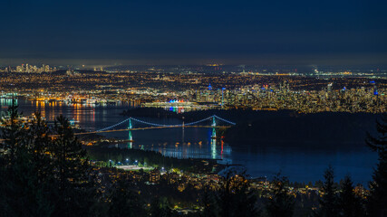 Panoramic view of Vancouver cityscape at night, British Columbia, Canada.