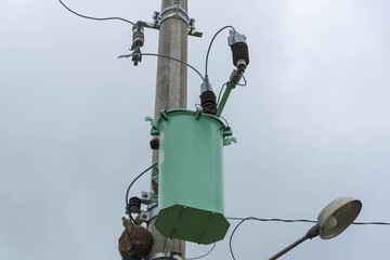 Public lighting pole with power transformer