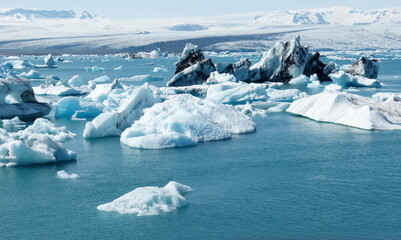 Arctic Icebergs  sparkling snow ice floes in glacial lagoon Jokulsarlon Iceland, amazing winter...