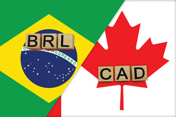 Brazil and Canada currencies codes on national flags background