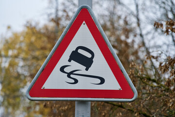 Traffic sign wach out for slippery road. © Michael Derrer Fuchs