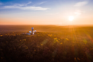 sunset behind teufelsberg with former listening station of usa © DEN