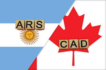 Argentina and Canada currencies codes on national flags background