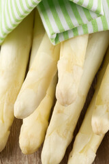 Fototapeta premium White asparagus bundled with a tea towel