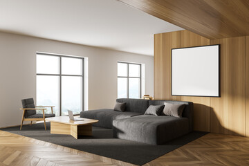 White and wooden living room corner with sofa and poster