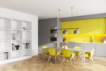 Gray and yellow kitchen corner with table