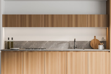 Obraz na płótnie Canvas Wooden kitchen interior with cupboards