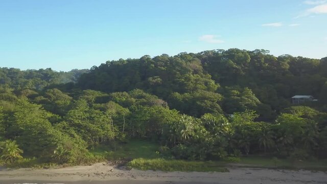 4k Costa Rica drone over beaches, jungle, beautiful oceans, and stunning sunsets. Travel, nature, vacation, paradise, coastal retreat, South American islands.