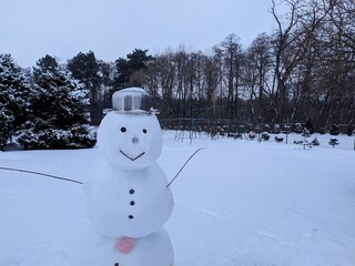 winter snowy holidays with snowman