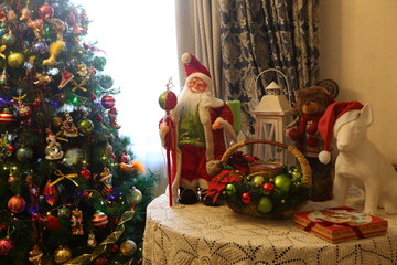 Still life with Christmas toys near the Christmas tree