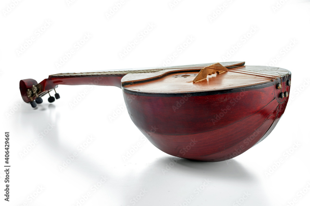 Wall mural Domra isolated on a white background. Ukrainian, Belarusian and Russia folk string instrument of the lute family with a round case.