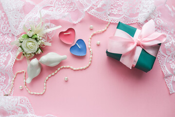 romantic composition for valentine's day. valentine's day background. red heart, lace, figurines of white birds and space for text