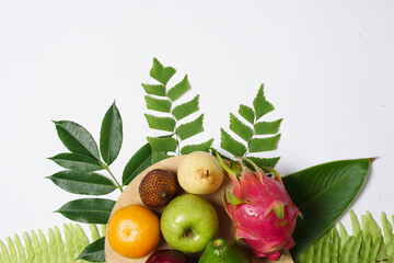 Combination of leaves and fresh fruits. Simple and elegant framing of fruit and leaves. Wallpaper...