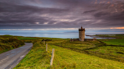 Doonagore Castle is a round 16th-century tower house with a small walled enclosure located about 1 km south of the coastal village of Doolin in County Clare, Ireland. 