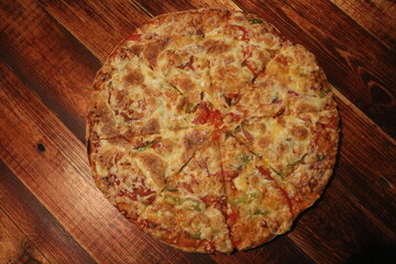 pizza on a wooden table