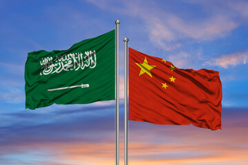 3D Rendering of Saudi Arabia & China Flags are Waving in the Sky - 3d illustration