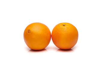 Couple delicious and healthy ripe oranges isolated