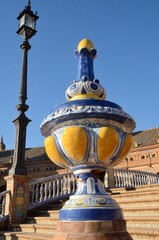 Tiles detail and iron lamp in Seville, Spain
