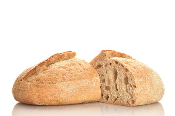 Two halves of a fragrant loaf without yeast with bran flakes, close-up, isolated on white.