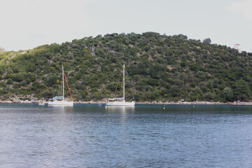 Fototapeta premium Sailing yacht in the Aegean Sea in Greece. Sailing.Sailing around Greece.
